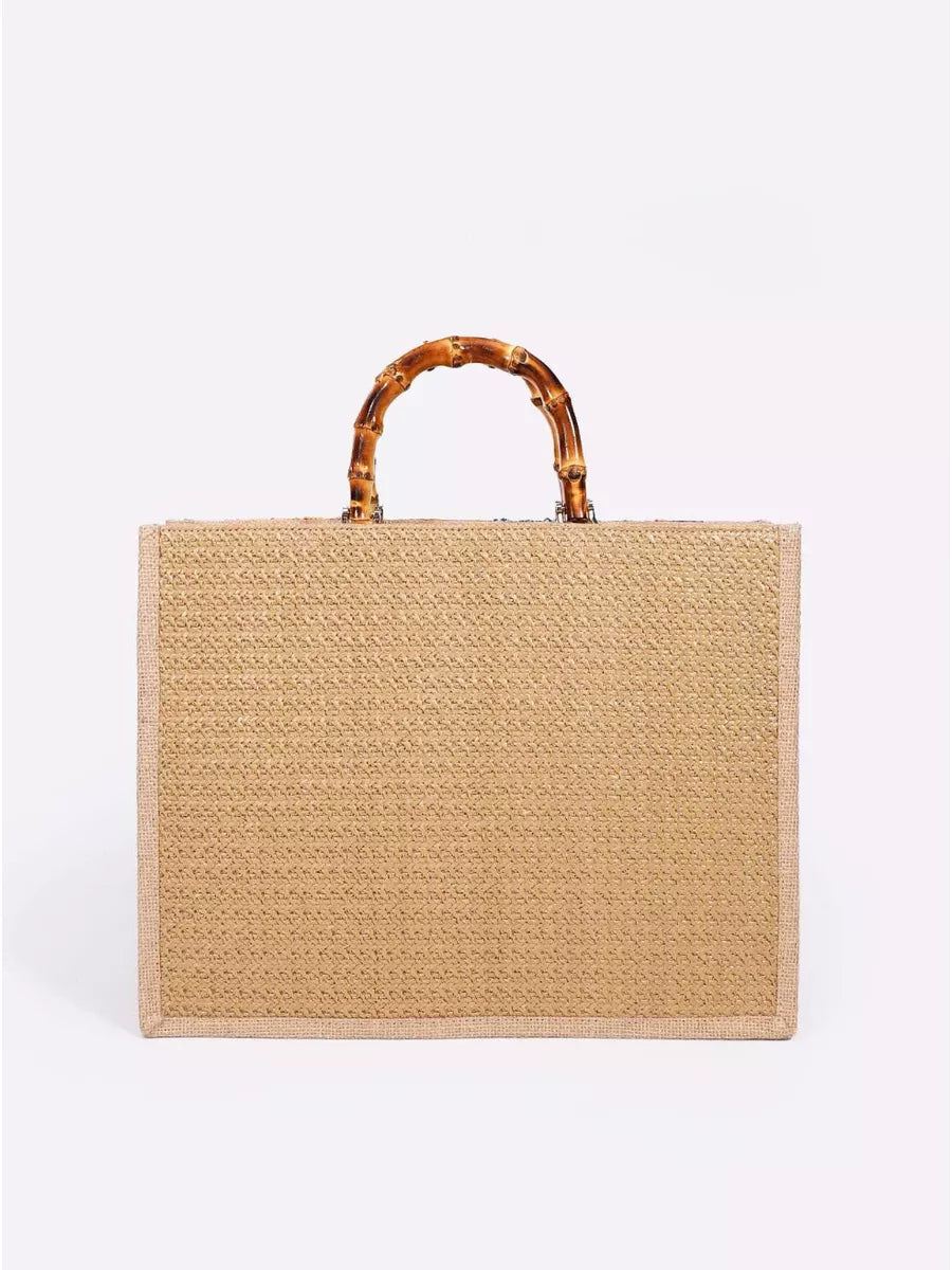Bolsa bordada com alça de bambu