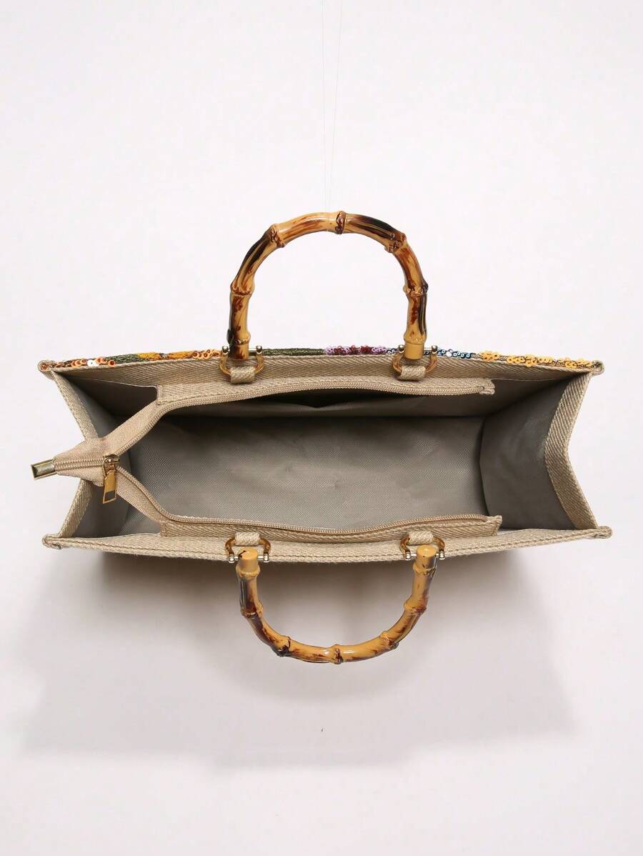 Bolsa bordada com alça de bambu